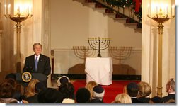 President George W. Bush delivers remarks during the lighting of the Menorah Monday, Dec. 15, 2008, in the Grand Foyer of the White House. This year's Menorah, currently housed at the Harry S. Truman Presidential Library in Independence, Mo., was a gift from Israel's first Prime Minister David Ben-Gurion to the U.S. President on May 7, 1951 - President Truman's birthday - to personally thank him for his important, and then-controversial recognition of Israel's independence three years prior. White House photo by Shealah Craighead