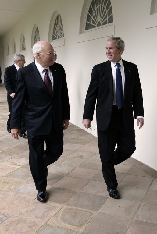 President Bush and VP Cheney walk through the Colonnade en route to motorcade to Pentagon Memorial Ceremony Sept. 11, 2008, on the anniversary of the attack on America. White House photo by David Bohrer