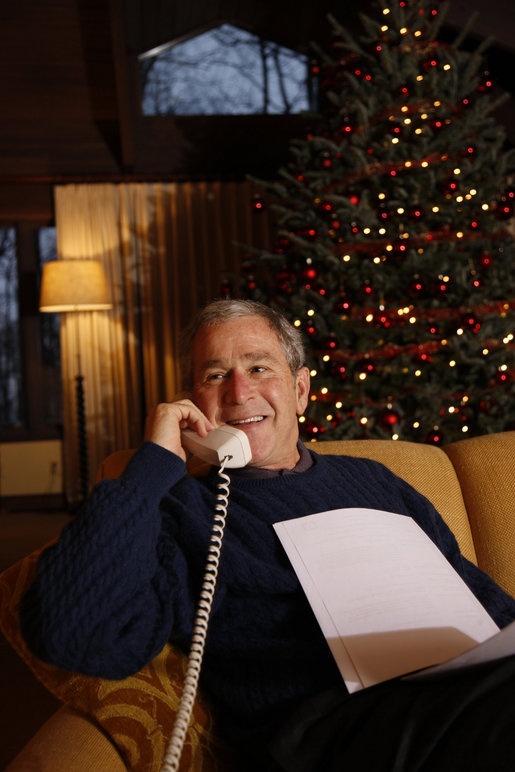 President George W. Bush makes Christmas Eve telephone calls to members of the Armed Forces, Wednesday, Dec. 24, 2008, from Camp David. White House photo by Eric Draper