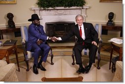 President George W. Bush shakes hands with the First Vice President of the Government of National Unity of Sudan and President of the Government of Southern Sudan Salva Kiir Mayardit during his visit Monday, Jan. 5, 2009, to the Oval Office of the White House.  White House photo by Eric Draper