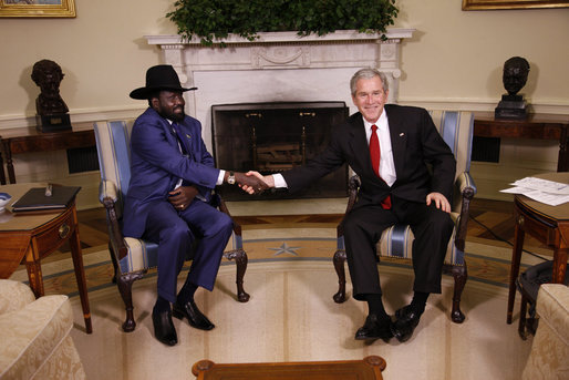 President George W. Bush shakes hands with the First Vice President of the Government of National Unity of Sudan and President of the Government of Southern Sudan Salva Kiir Mayardit during his visit Monday, Jan. 5, 2009, to the Oval Office of the White House. White House photo by Eric Draper