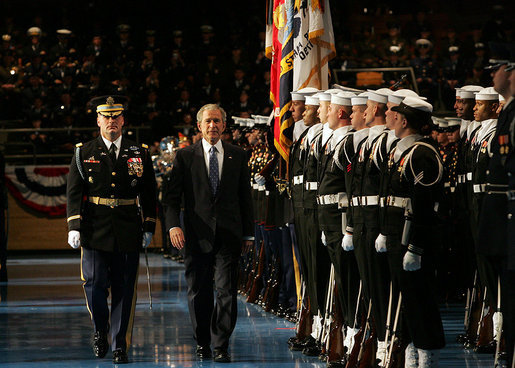President George W. Bush reviews the troops at Ft. Myer in Arlington, Va., Tuesday, Jan. 6, 2009, during a military appreciation in his honor. With him is Col. Joseph Buche, Commander of Troops. White House photo by Joyce N. Boghosian