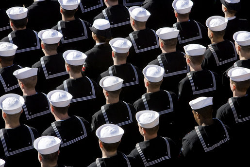 U.S. Navy Sailors stand at attention Saturday, Jan. 10, 2009, during commissioning ceremonies for the USS George H.W. Bush (CVN 77) aircraft carrier in Norfolk, Va. White House photo by David Bohrer