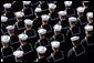 U.S. Navy Sailors stand at attention Saturday, Jan. 10, 2009, during commissioning ceremonies for the USS George H.W. Bush (CVN 77) aircraft carrier in Norfolk, Va. White House photo by David Bohrer