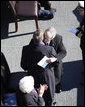 President George W. Bush embraces his father, former President George H. W. Bush, following his remarks honoring his father during the commissioning ceremony of the USS George H. W. Bush (CVN 77) aircraft carrier Saturday, Jan 10, 2009 in Norfolk, Va. White House photo by Eric Draper