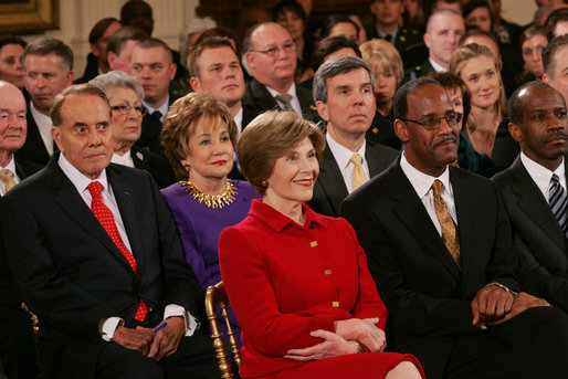 Mrs Laura Bush smiles as she listens to President George W. Bush deliver his farewell address to the nation Thursday evening, Jan. 15, 2009, from the East Room at the White House. White House photo by Joyce N. Boghosian