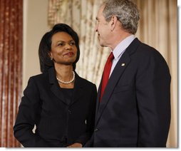 President George W. Bush is introduced by U.S. Secretary of State Condoleezza Rice at the U.S. Department of State Thursday, Jan. 15, 2009, during a ceremony commemorating foreign policy achievements. White House photo by Eric Draper