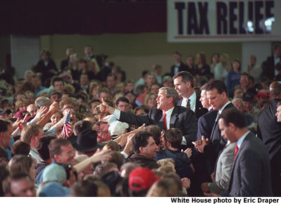 President Bush greets people in the crowd in Billings, Montana at the Metrapark Expo and Convention Center. White House photo by Eric Draper.