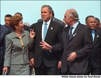 President Bush talks with Panama's President Mireya Moscoso and Argentina's President Fernando de la Rua prior to the official group photo at the Citadelle during the Summit of the Americas in Quebec City, Canada. White House photo by Paul Morse.