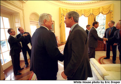 President Bush welcomes Senator Ted Kennedy into the Oval Office. White House photo by Eric Draper.