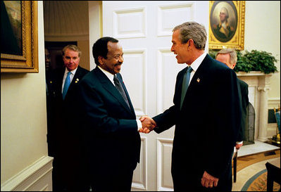 On the eve of the war in Iraq, President Bush meets with President Paul Biya of Cameroon for a bilateral meeting and dinner at the White House Thursday, March 20, 2003. The President congratulated President Biya on Cameroon's successful record of reform, and encouraged him to continue to tackle sensitive issues, such as governance and privatization. President Bush praised Biya for his leadership to resolve the Bakassi dispute peacefully. President Biya has been supportive of U.S. effort to combat international terrorism.