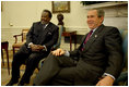 President George W. Bush and President Ismail Omar Guelleh of Djibouti greet the press during a meeting in the Oval Office Jan. 21, 2003. President Bush and President Guelleh discussed the issues affecting the common interests of the United States and Djibouti. The President thanked President Guelleh and the Djiboutian people for their continued cooperation on the global war on terrorism. The President announced that the United States will open a USAID office in Djibouti to more effectively address both humanitarian and development efforts. 