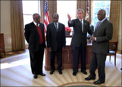 President George W. Bush hosts President Festus Gontebanye Mogae of Botswana, President Joaquim Albetto Chissano of Mozambique and President Jose Eduardo dos Santos of Angola in the Oval Office Feb. 26. 2002. The four presidents discussed their common interests to work bilaterally and through the Southern Africa Development Community to bring greater peace and stability to the region. President Bush encouraged President dos Santos to end 26 years of civil war in Angola and welcomed dos Santos’ pledge to move quickly to achieve a cease-fire and normalization of politics in Angola.