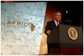 President George W. Bush addresses the Corporate Council on Africa's U.S.- Africa Business Summit in Washington, D.C., Thursday, June 27, 2003. "All of us here today share some basic beliefs. We believe that growth and prosperity in Africa will contribute to the growth and prosperity of the world. We believe that human suffering in Africa creates moral responsibilities for people everywhere. We believe that this can be a decade of unprecedented advancement for freedom and hope and healing and peace across the African continent," President Bush said. 