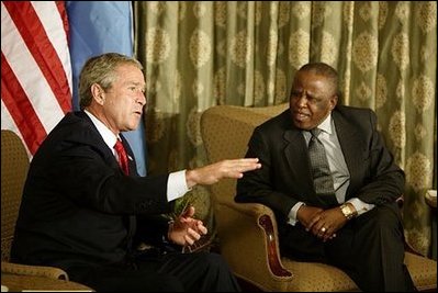 President George W. Bush begins participation in meeting with the President Festus Magae of Botswana in Gaborone, Botswana, Thursday, July 10, 2003. “We're thrilled to be here. You have been a very strong leader,” said President Bush during their joint press conference. “First, I want to commend you for your leadership. I appreciate your commitment to democracy and freedom, to rule of law and transparency. I want to congratulate you for serving your country so very well.” 