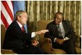 President George W. Bush begins participation in meeting with the President Festus Magae of Botswana in Gaborone, Botswana, Thursday, July 10, 2003. “We're thrilled to be here. You have been a very strong leader,” said President Bush during their joint press conference. “First, I want to commend you for your leadership. I appreciate your commitment to democracy and freedom, to rule of law and transparency. I want to congratulate you for serving your country so very well.” 