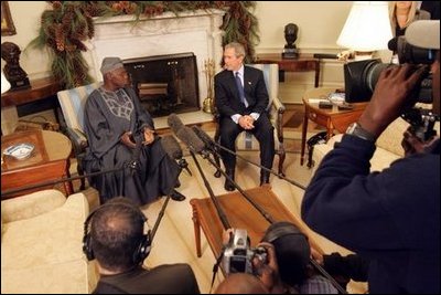 President George W. Bush meets with Nigerian President Olusegun Obasanjo in the Oval Office Thursday, Dec. 02, 2004. "I think it is vital that the continent of Africa be a place of freedom and democracy and prosperity and hope, where people can grow up and realize their dreams," President Bush said after the meeting. "It's a continent that has got vast potential, and the United States wants to help the people of Africa realize that potential." 