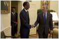 President George W. Bush meets with the President Paul Kagame of Rwanda in the Oval Office Friday, April 15, 2005.