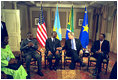 President George W. Bush meets with President Joseph Kabila of the Democratic Republic of Congo, left, President Thabo Mbeki of South Africa, center, and President Paul Kagame of Rwanda, right, at the Waldorf-Astoria Hotel in New York City Sept. 13, 2002. President Bush joined President Mbeki, Chairman of the African Union, to promote stability in the Great Lakes region and urged President Kagame to end support to Congolese rebel groups and begin withdrawal from Congo. President Bush also called on President Kabila to end support to the Rwandan rebels and arrest genocide suspects who had sought refuge in the Democratic Republic of the Congo. President Kagame announced that same afternoon that Rwandan forces would withdraw from Congo.