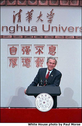 President George W. Bush talks with university students at Tsinghua University in Beijing, Friday, Feb. 22, 2002. 