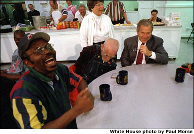 President George W. Bush visits the St. Augustine Parish Hunger Center in Cleveland, Ohio. White House photo by Paul Morse.