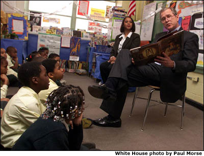 President Bush reads to elementary school students in Washington, D.C. White House photo by Paul Morse.