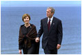 President Bush and Mrs. Bush take a walking tour of Omaha Beach at Normandy, France, May 27.