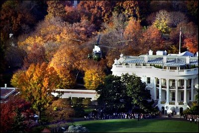 The fall foliage is in full view as Marine One departs the South Lawn. The Southern Magnolias to the left of the South Portico were planted by President Andrew Jackson. 