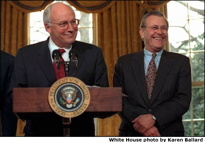 Vice President Cheney speaks at lecturn. Defense Secretary Donald Rumsfeld stands next to him. White House photo by Karen Ballard.