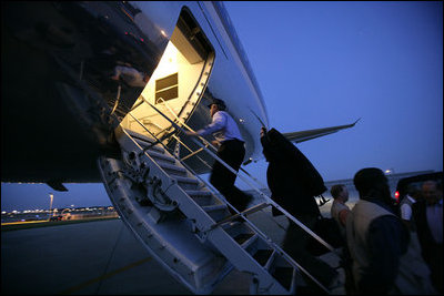 President George W. Bush boards Air Force One at Andrews Air Force Base Monday night, June 12, 2006, en route to Iraq. White House photo by Eric Draper 