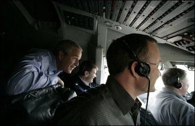 President George W. Bush rides in the cockpit of Air Force One on the final approach before landing in Baghdad Tuesday, June 13, 2006. White House photo by Eric Draper 