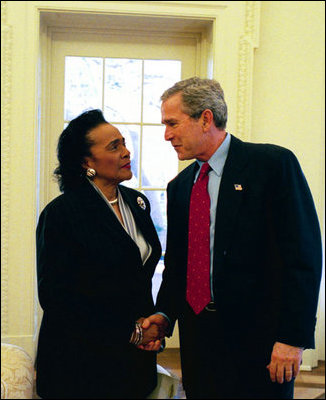 President George W. Bush meets Coretta Scott King in the Oval Office, Feb. 25, 2004.