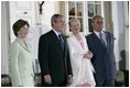 President George W. Bush and Mrs Bush join Her Majesty Queen Margrethe II and His Royal Highness The Prince Henrik of Denmark after arriving at the Fredensborg Palace, Tuesday, July 5 2005.