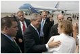 Employees and their children from the American Embassy in Denmark gather to bid farewell to President George W. Bush at Copenhagen's International Airport Wednesday, July 6, 2005.