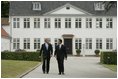 President George W. Bush is greeted by Danish Prime Minister Anders Fogh Rasmussen at his summer residence in Marienborg in Kongens Lyngby, Denmark, Wednesday, July 6, 2005.