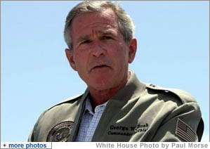 President George W. Bush makes remarks to military personnel and their families at Marine Air Corps Station Miramar near San Diego, CA on August 14, 2003.