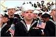 Sailors listen to President George W. Bush aboard the USS Enterprise in Norfolk.