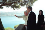 President George W. Bush and Mrs. Bush are given a tour by the Pope in August 2001 of his country retreat, Castel Gandolfo.