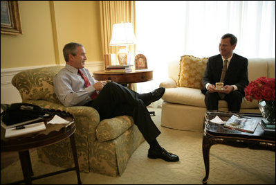 President George W. Bush meets for coffee early Wednesday morning, July 20, 2005 with Supreme Court Justice Nominee John G. Roberts, prior to a joint media appearance at the White House. 