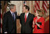 President George W. Bush, Thursday, Sept. 29, 2005 in the East Room of the White House in Washington, congratulates Chief Justice John G. Roberts and his wife Jane, after he is sworn-in as the 17th Chief Justice of the United States.