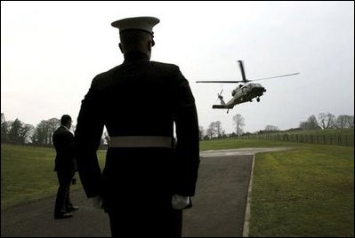 President George W. Bush arrives aboard Marine One at Hillsborough Castle in Northern Ireland, Monday, April 7, 2003.