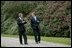 President George W. Bush and British Prime Minister Tony Blair walk through the grounds of Hillsborough Castle in Northern Ireland, Monday, April 7, 2003.