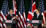 President George W. Bush and British Prime Minister Tony Blair hold a joint press conference at Hillsborough Castle near Belfast, Northern Ireland, Tuesday, April 8, 2003. 