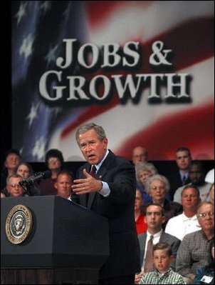 President George W. Bush addresses small business owners and employees during a roundtable discussion at the Robinson Center in Little Rock, Ark., Monday, May 5, 2003.