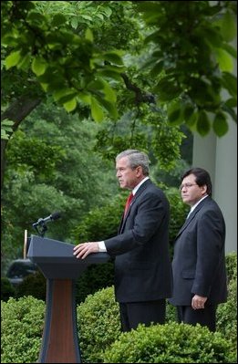 As Counsel Judge Alberto Gonzales stands by his side, President George W. Bush delivers remarks regarding his judicial nominations in the Rose Garden Friday, May 9, 2003. President Bush has sent 34 judicial nominees to the Senate , but only 17 of those nominated have received a vote. 