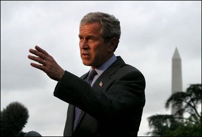Departing the White House via Marine One, President George W. Bush talks with the media on the South Lawn Friday, May 16, 2003.