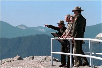 President George W. Bush and Interior Secretary Gale Norton tour Moro Rock and the surrounding areas at Sequoia National Park in California. File photo. 