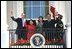 At the end of the ceremony, President Bush, Mrs. Bush, President Arroyo and Mr. Arroyo wave from the Truman Balcony. 