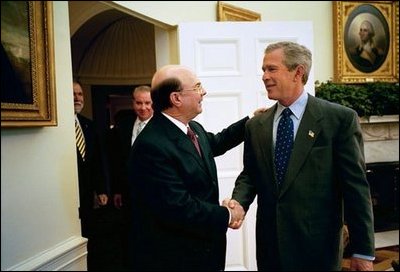 President George W. Bush meets with President Hipolito Mejia of the Dominican Republic in the Oval Office Tuesday, May 20, 2003.