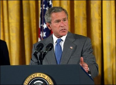 President George W. Bush discusses the benefits of the Jobs and Growth Tax Reconciliation Act of 2003 in the East Room Wednesday, May 28, 2003. "We are helping workers who need more take-home pay. We're helping seniors who rely on dividends. We're helping small business owners looking to grow and to create more new jobs. We're helping families with children who will receive immediate relief," said the President in his remarks.